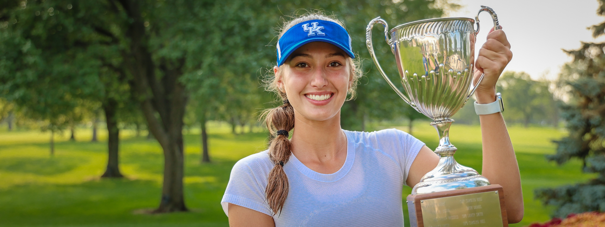 Wenzler claims medalist honors